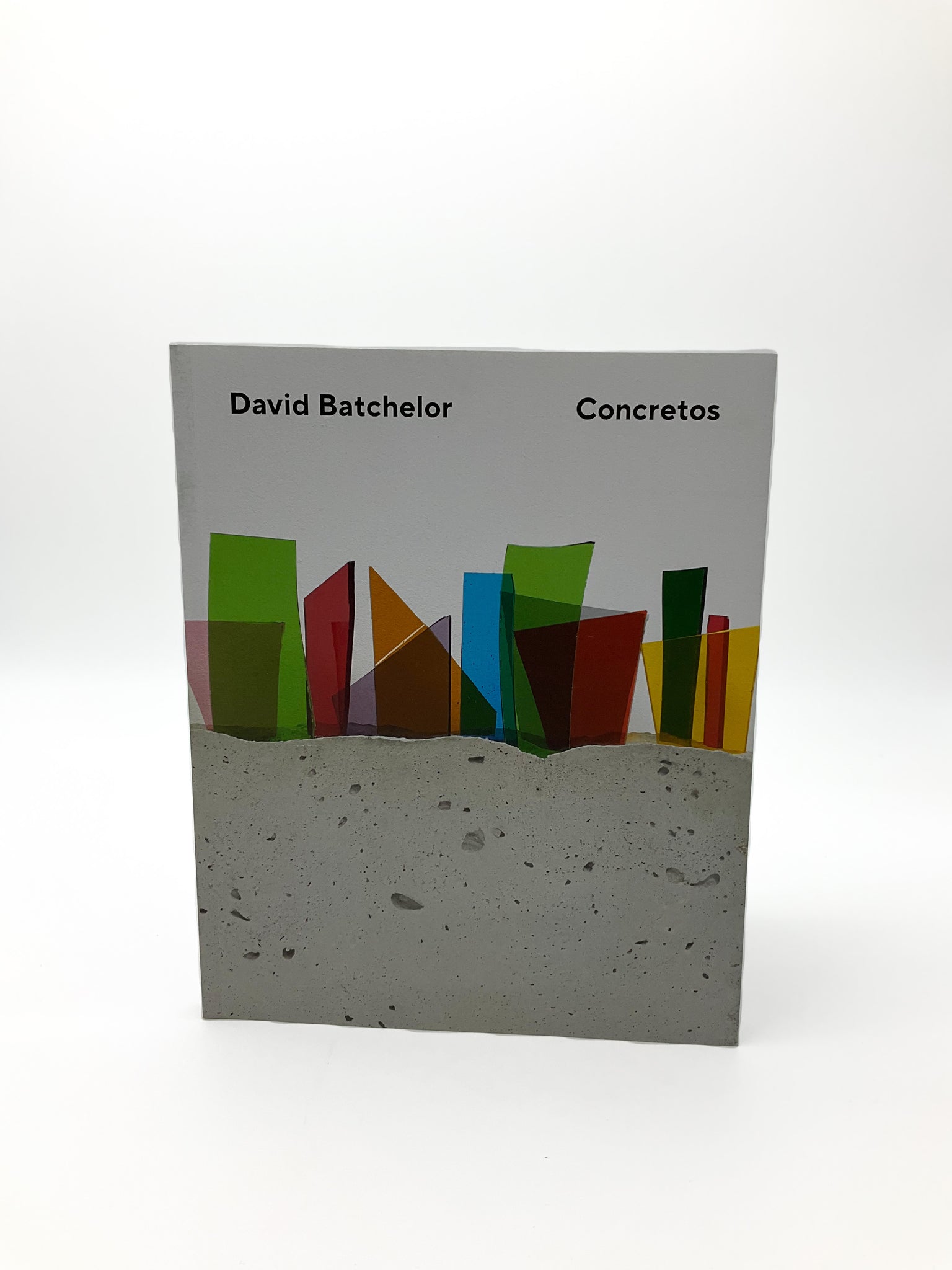 This new publication is devoted to an ongoing series of sculptures titled Concretos. First made in 2011, Concretos combine concrete with a variety of brightly colored – and often found – materials.